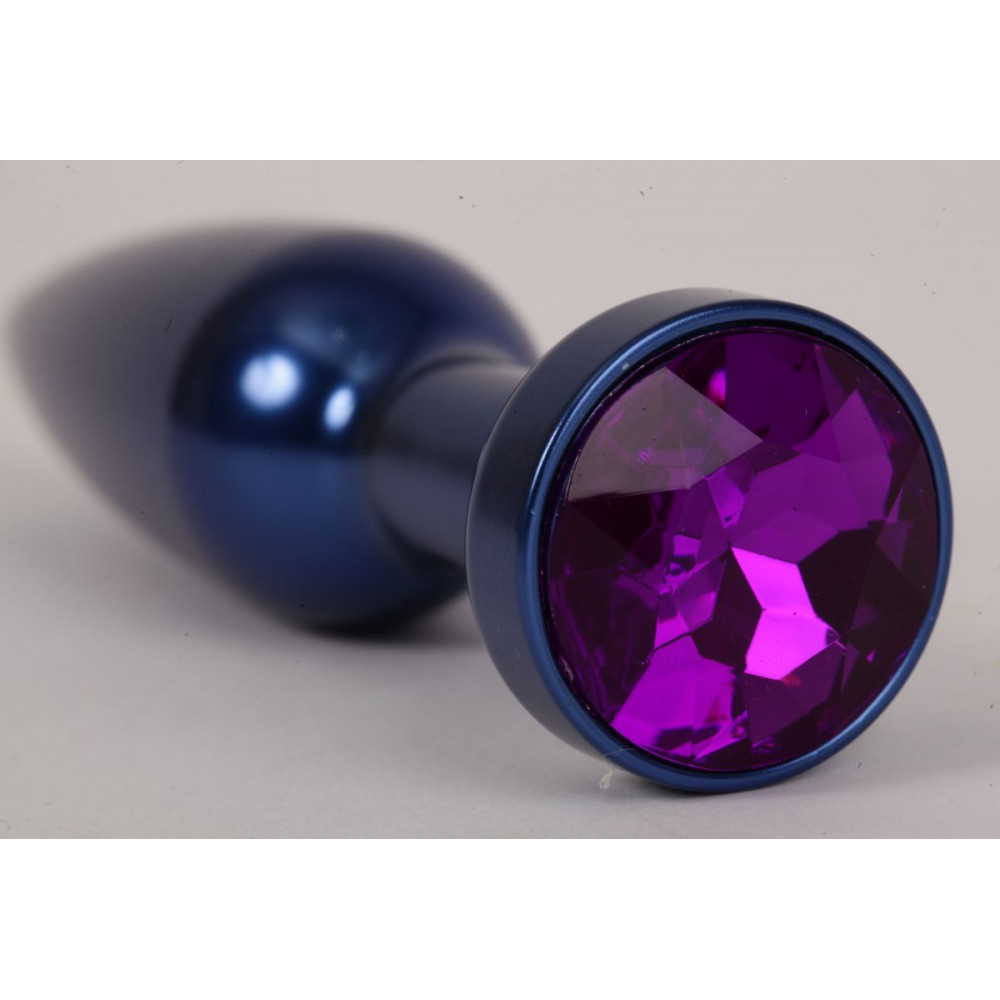 Большая синяя анальная пробка с фиолетовым стразом - 11,2 см. Большая синяя анальная пробка с фиолетовым стразом - 11,2 см.